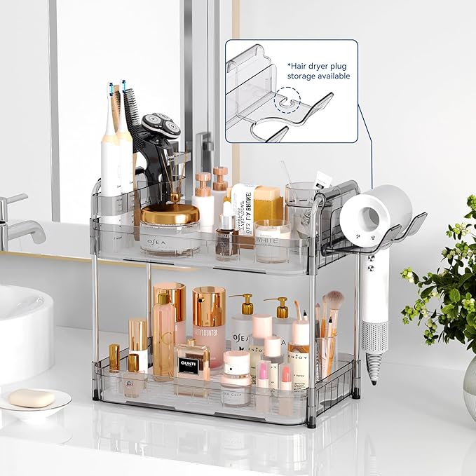 Bathroom Counter Organizer, 2 Tier Makeup Skincare Storage Tray with Hair Dryer Holder and Toothbrush Rack, Perfume Organizer Vanity Shelf for Countertop, Dresser (Transparency)